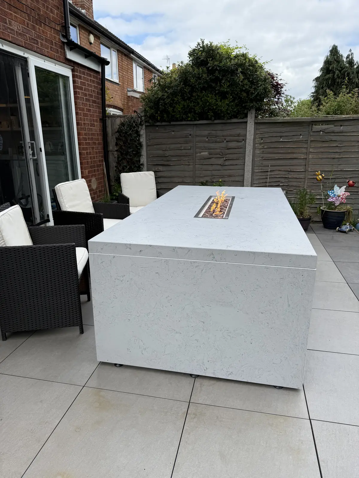An outdoor kitchen and bespoke fire pit table in Birmingham, image 5