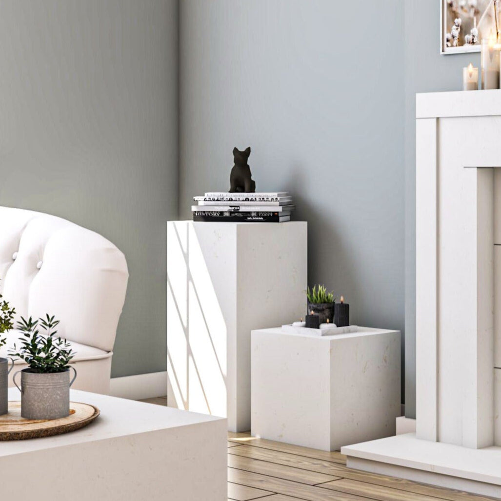 Stone pedestal and cube accent tables