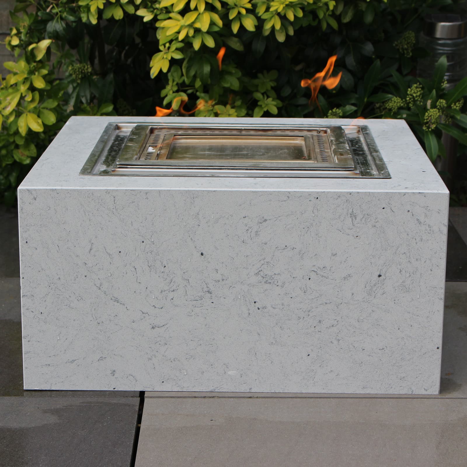 Outdoor bioethanol fire cube in terrazzo