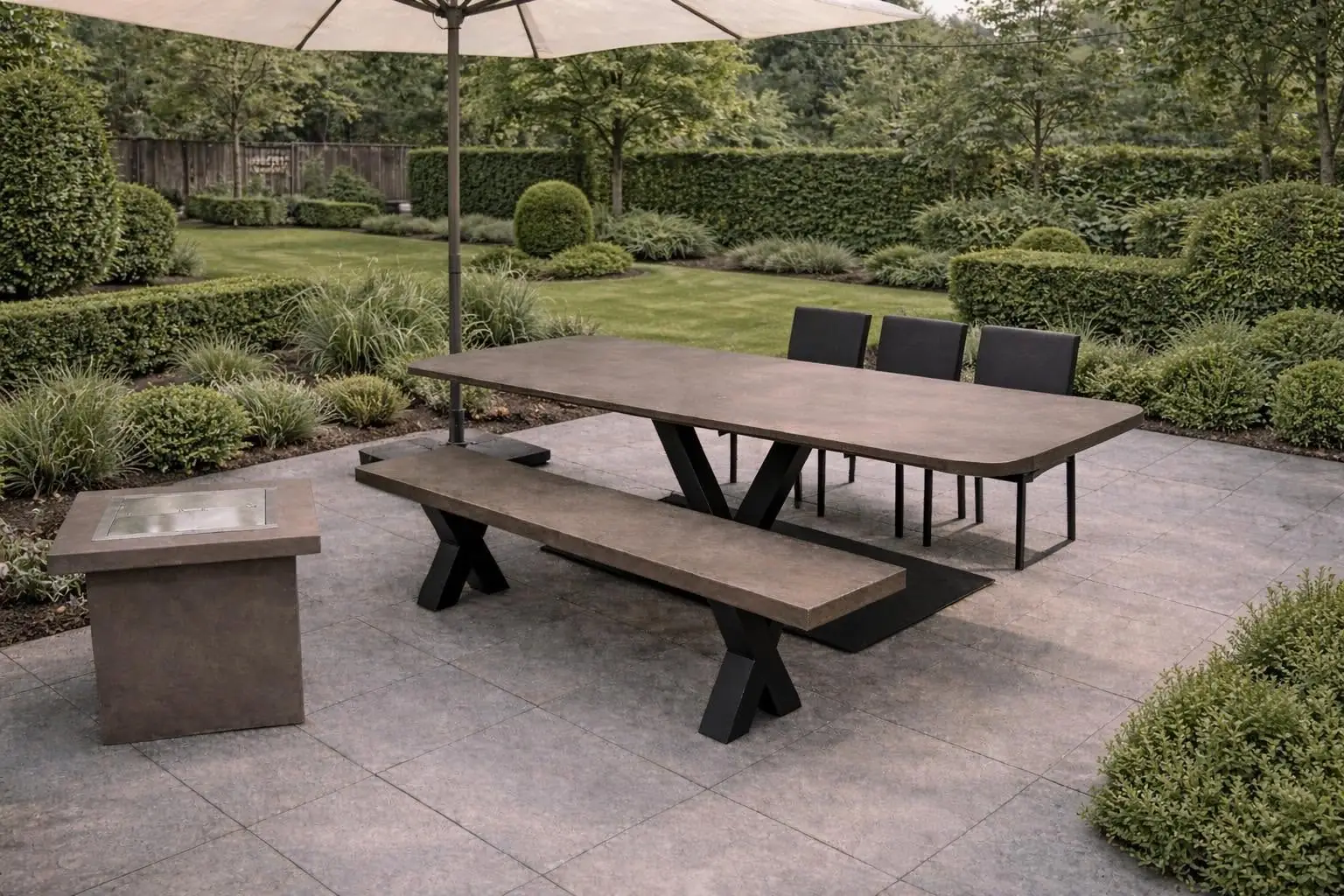 Outdoor bioethanol fire cube beside a stone dining table in a garden