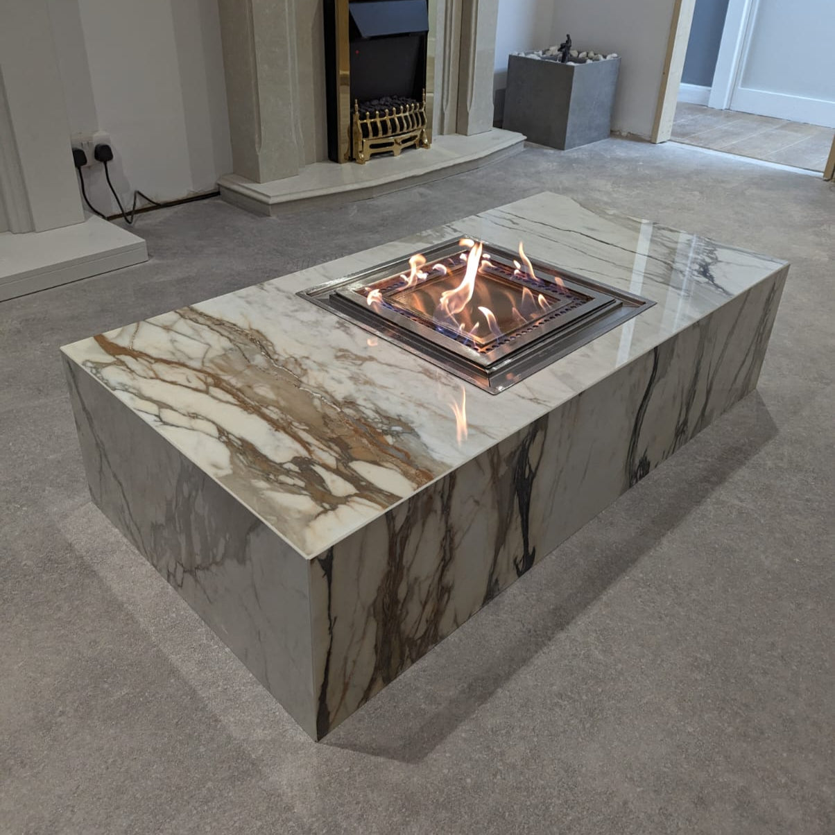 Stone bioethanol fire pit table burning outdoors