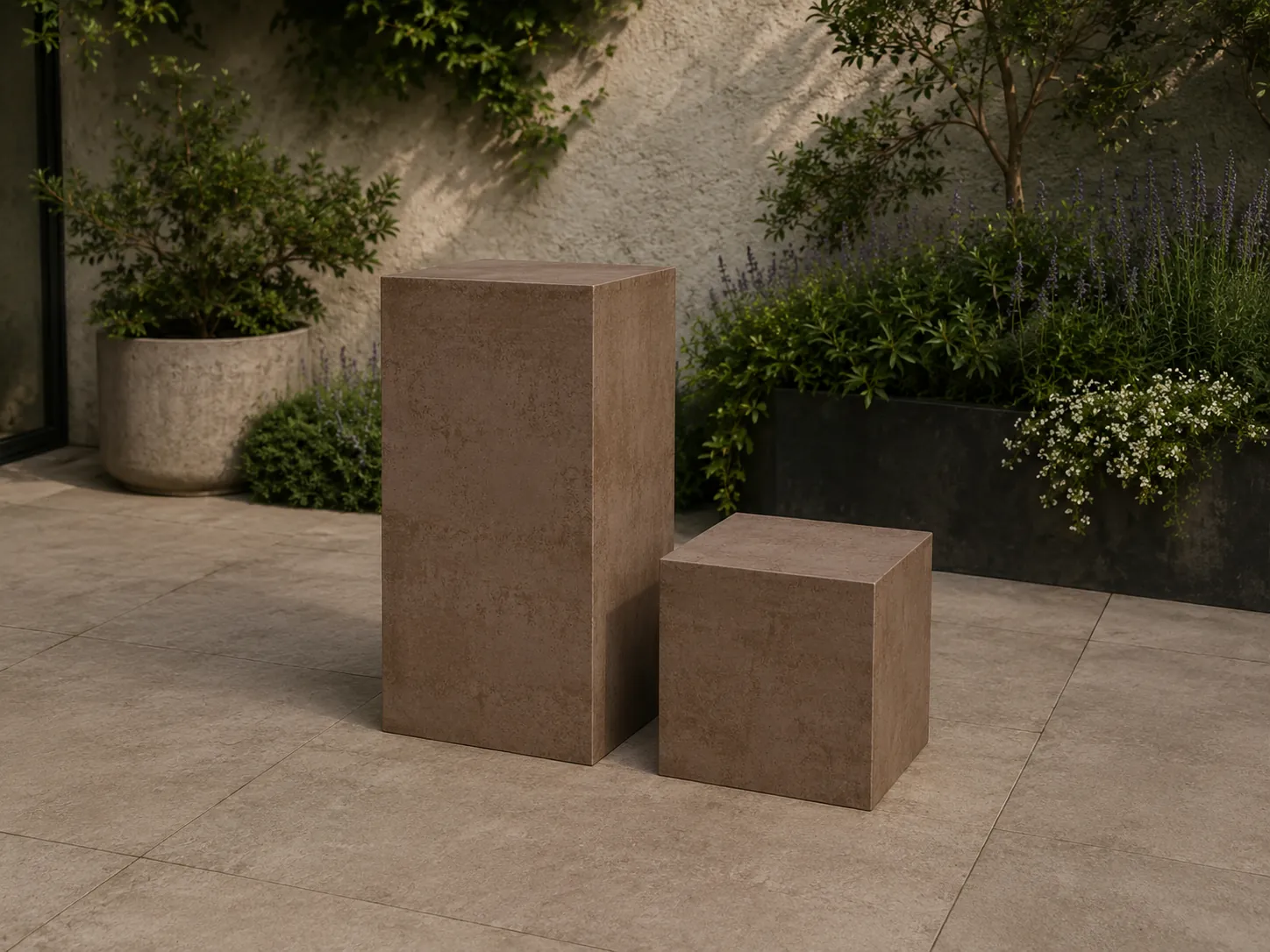 Outdoor pedestal and cube set shown in Corten porcelain