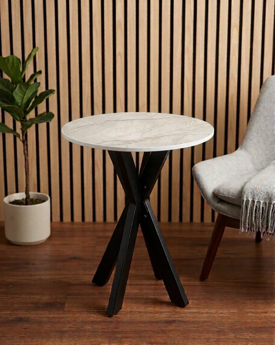Round side table shown in White Root porcelain
